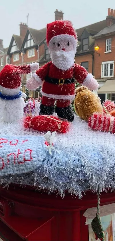 Colorful yarn Santa and snowman on mailbox.