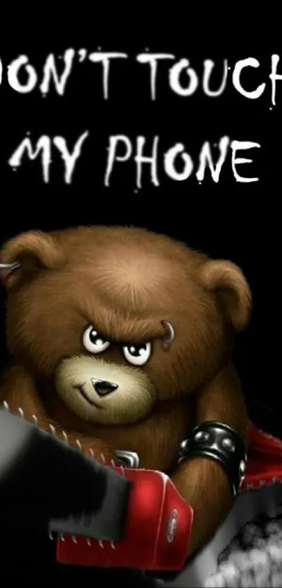 Aggressive bear warns not to touch phone with a chainsaw in hand.