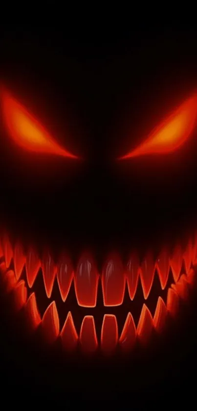 Fiery-eyed monster face with sharp teeth.