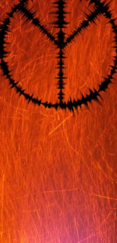 Fiery abstract peace symbol on an orange background.