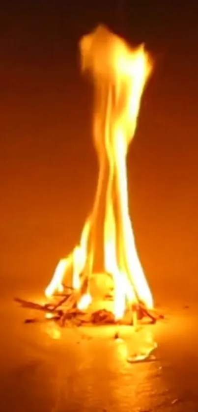 A mobile wallpaper of bright, warm flames against a dark background.