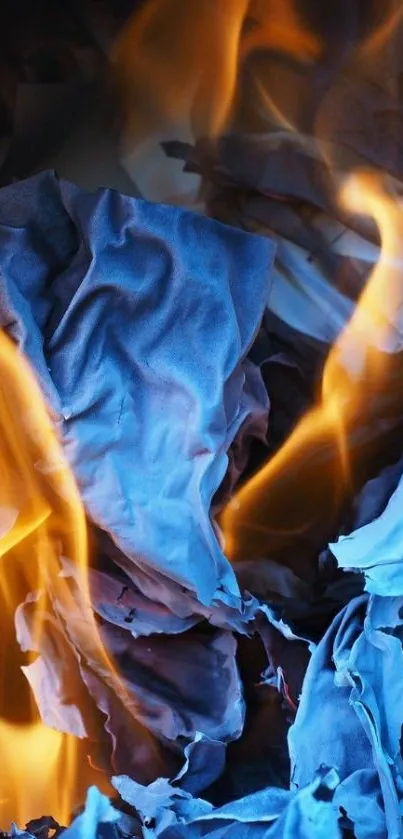 Blue paper and orange flames abstract wallpaper.