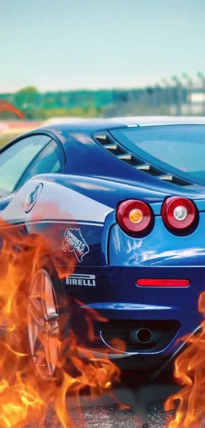 Blue sports car with flames in action, perfect for phone wallpaper.