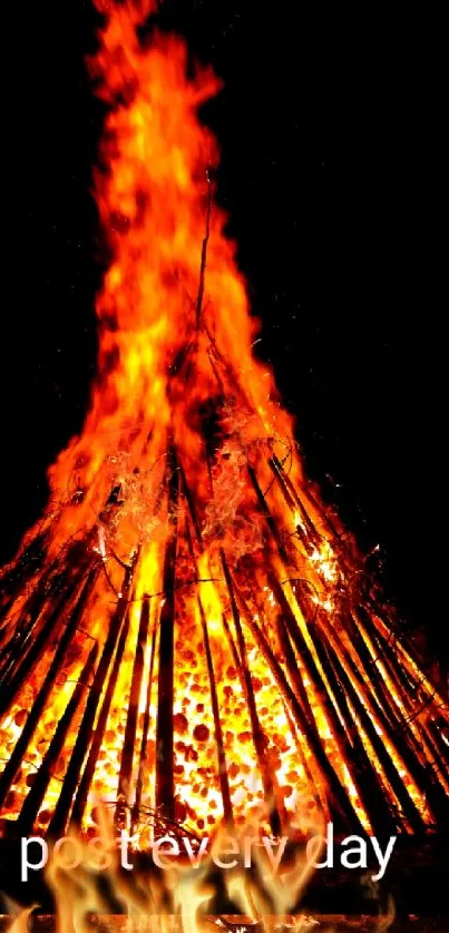 Bonfire flames creating a fiery orange design for a mobile wallpaper.