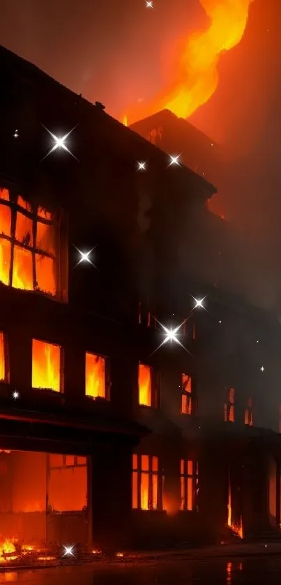 Building engulfed in flames during nighttime.