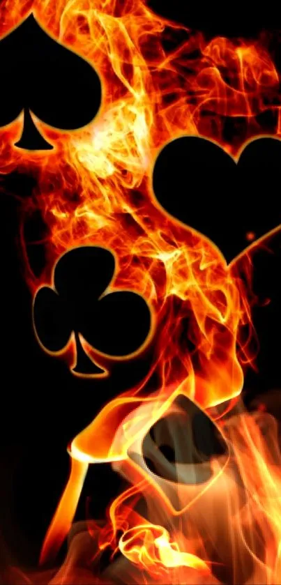 Mobile wallpaper with fiery card symbols, spades, hearts, and clubs engulfed in flames.