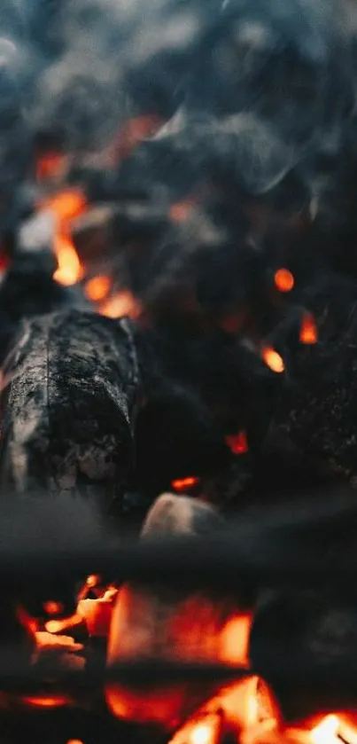 Image of glowing embers and smoky charcoal background.