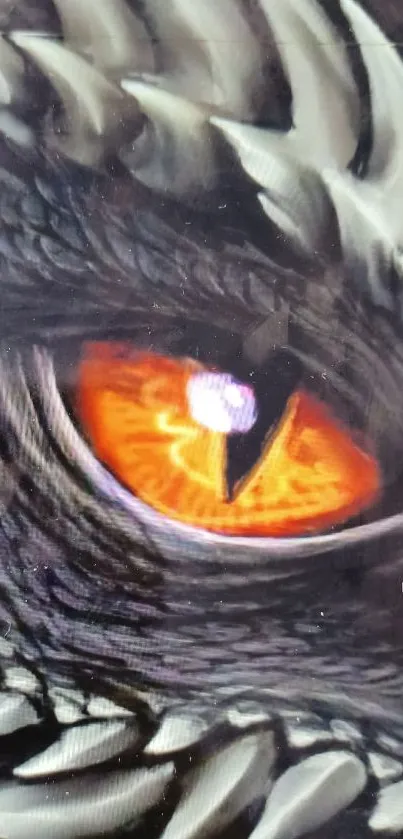 Closeup of a dragon's fiery orange eye in detail.