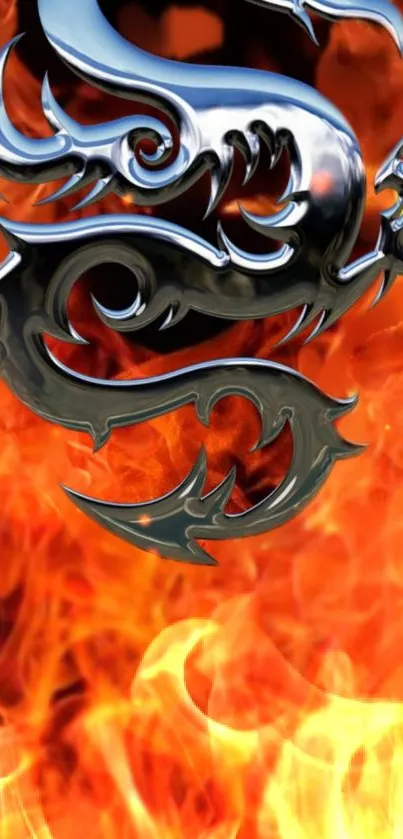 Fiery metal dragon over vibrant flames wallpaper.