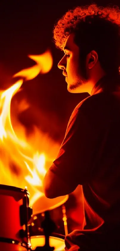 Side view of drummer with fiery flames in vibrant orange tones.