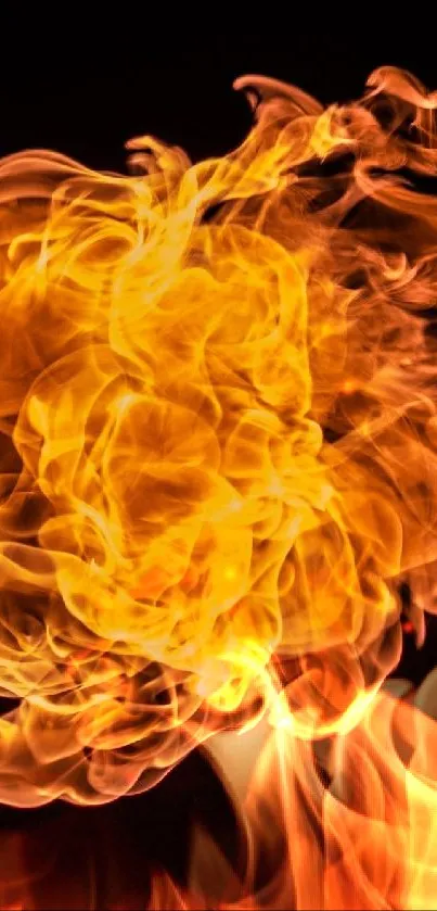 Bright and dynamic fiery flame on black background wallpaper.