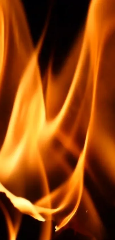 Orange flames creating an abstract fire pattern in the dark background.