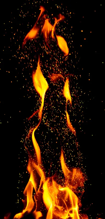 Vibrant orange flames against a dark background wallpaper.