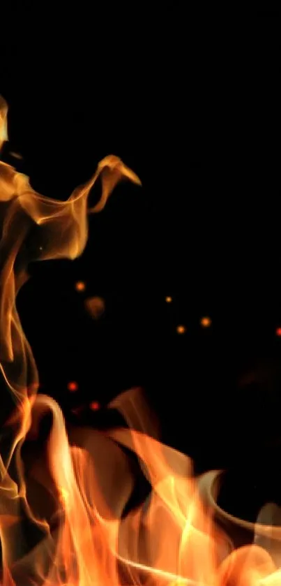 Vibrant flames dancing against a dark background in this mobile wallpaper.