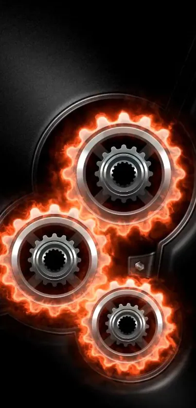 Wallpaper with fiery gears and orange flames on black.