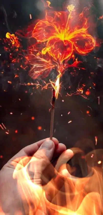 Hand holding a fiery, magical flame in a forest setting.