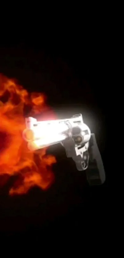 Handgun with fiery burst on black background wallpaper.