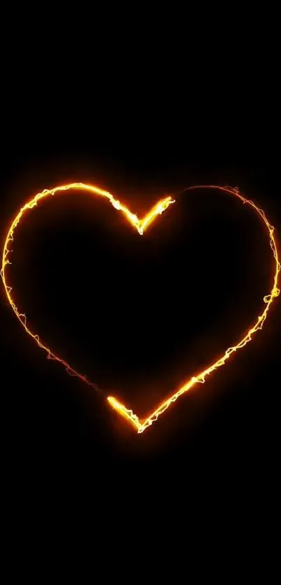 Orange fiery heart glowing on a black background for wallpaper.