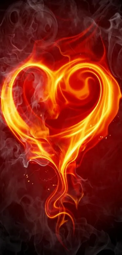 Fiery heart with flames and smoke on a dark background.