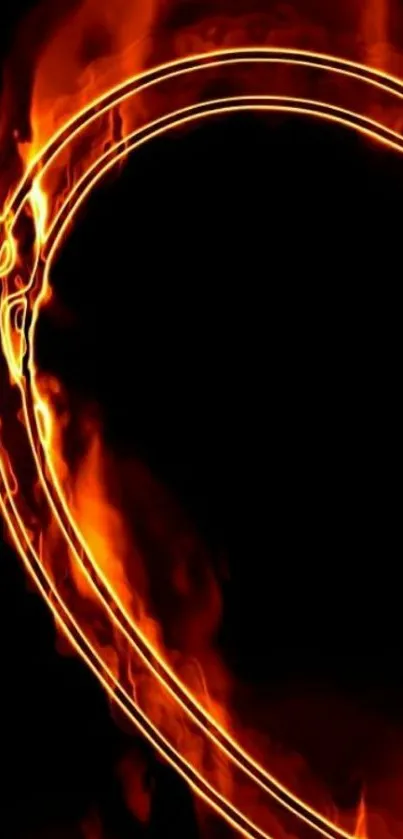 Fiery heart with orange flames on black background wallpaper.