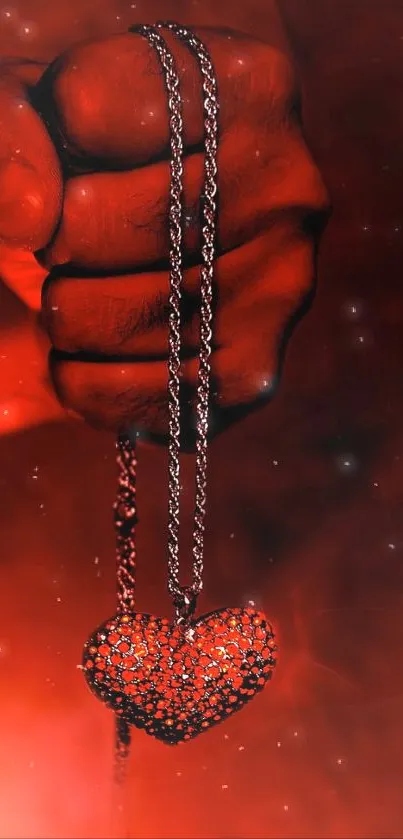 Hand holding heart pendant on a fiery red background.