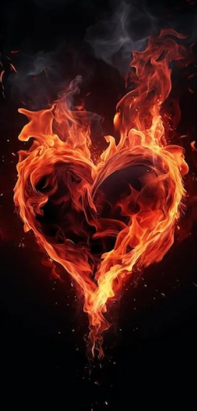 Fiery heart made of flames on dark background.