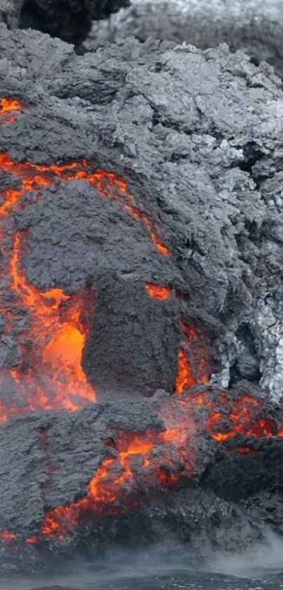 Vibrant fiery lava flow against rocky terrain, showcasing nature's power.