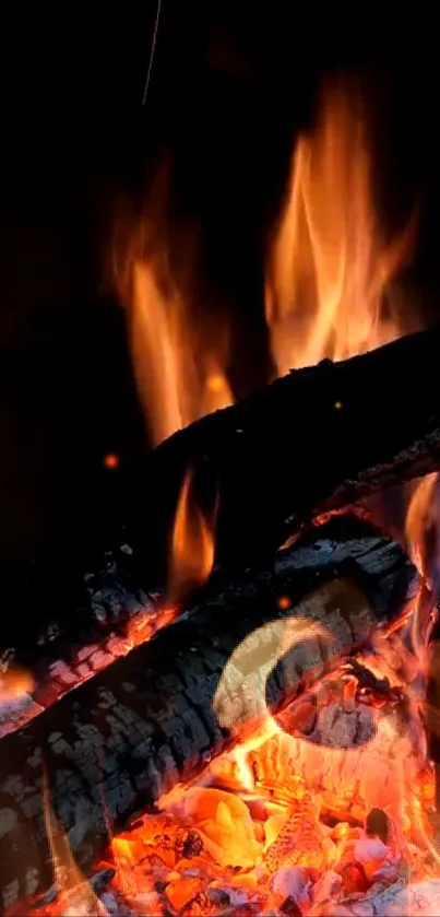 Fiery logs and glowing embers wallpaper, vibrant and warm display for mobile.