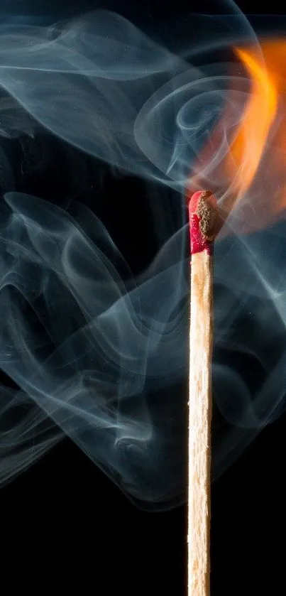 A lit matchstick with smoke on a dark background, creating fiery art.