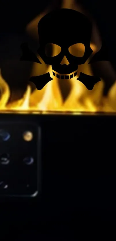 Mobile phone with fiery skull and flames on screen.