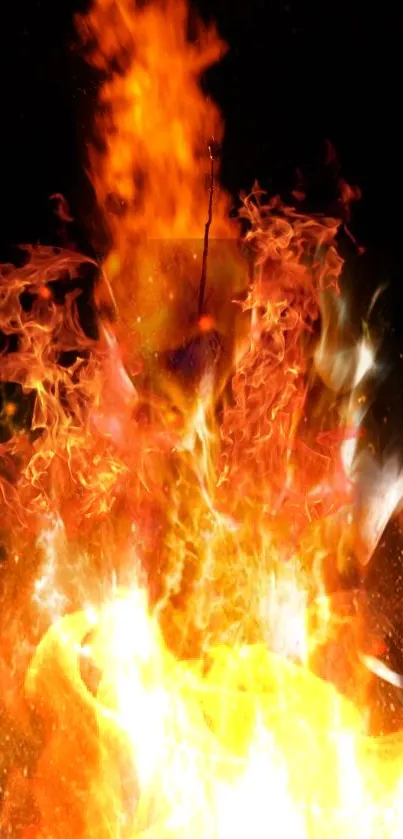 Fiery orange flames burst dynamically on this mobile wallpaper.