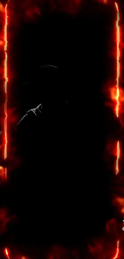 Mobile wallpaper with orange flames and dark silhouette.