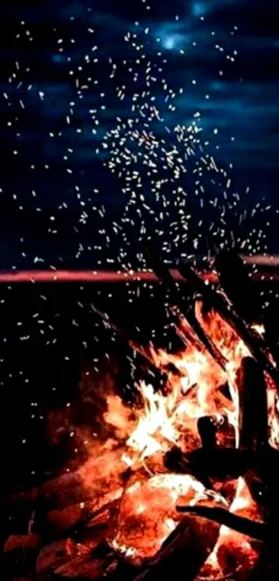 Bonfire under a starry dark sky.