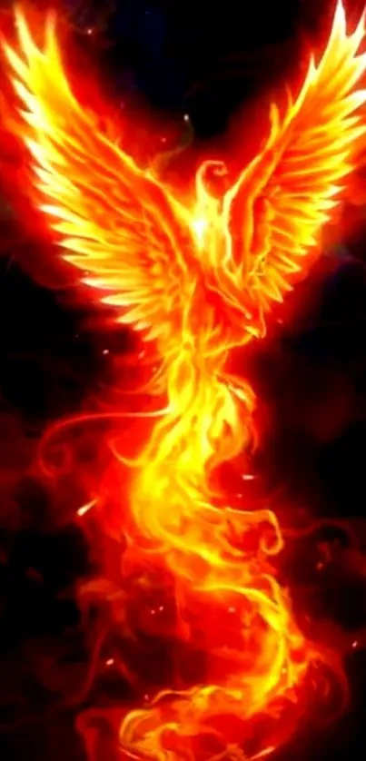 Fiery phoenix rising in vivid flames against a dark backdrop.