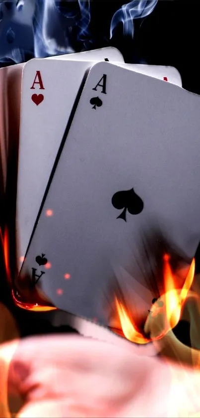 Fiery playing cards with smoke and flames for mobile wallpaper.