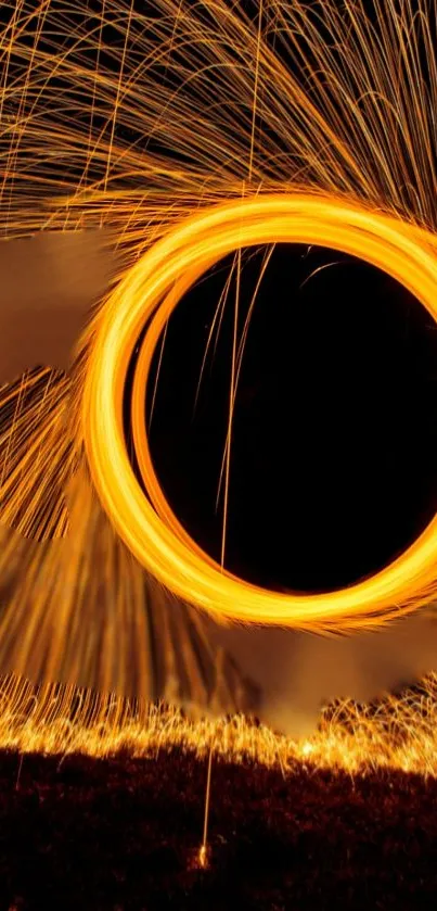 Fiery ring of sparks in steel wool photography, creating a stunning abstract design.