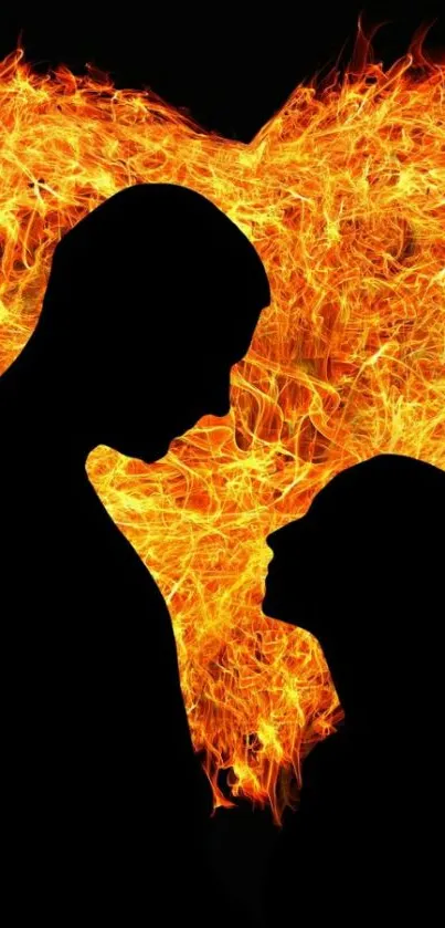 Silhouette couple with fiery heart background.