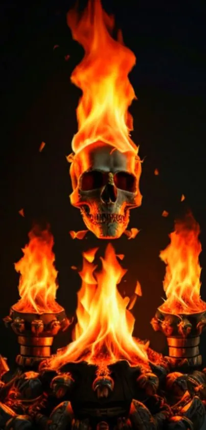 Fiery skull and flames art wallpaper on dark background.