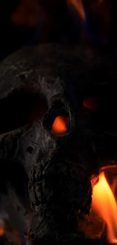 Fiery skull with dark background, intense flames.