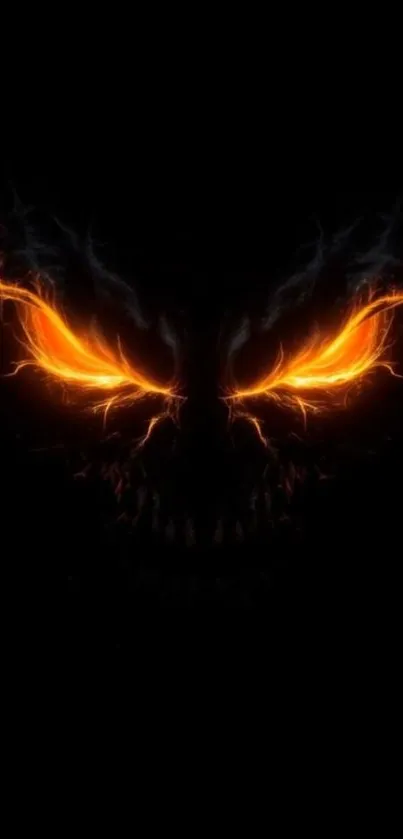 Mobile wallpaper with fiery skull and glowing orange eyes on a dark background.