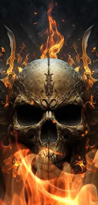 Fiery skull wallpaper with flames and dark wings on mobile background.