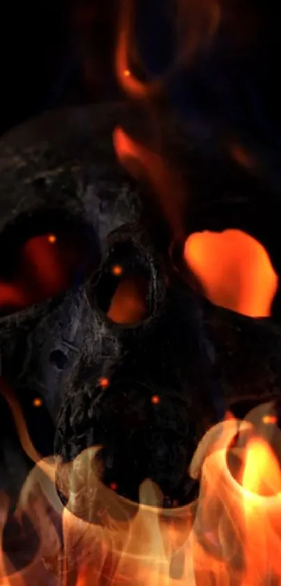 Dark skull with vibrant flames engulfing it.