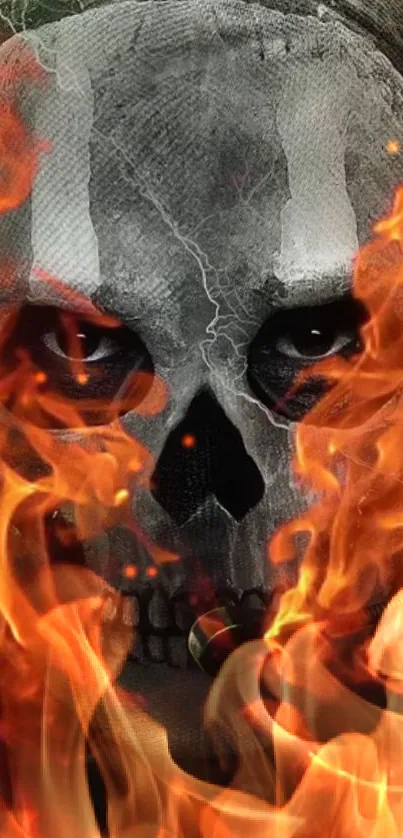 Skull engulfed in orange flames, intense design, mobile wallpaper.