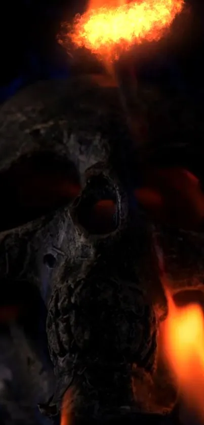 A fiery skull with glowing flames on a dark background.