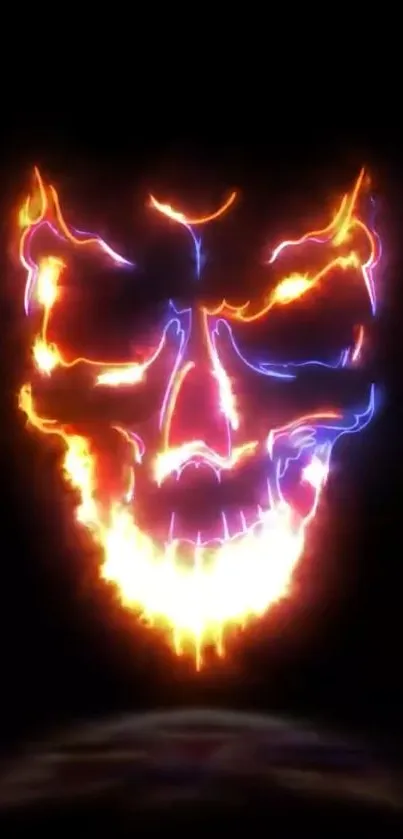 Fiery neon skull with bold flames on black background.