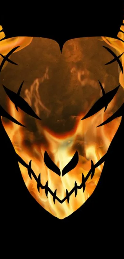 Fiery skull with flames on black mobile wallpaper.