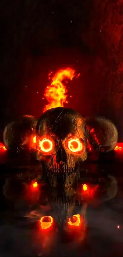 Fiery skull with glowing eyes on a red and black background wallpaper.