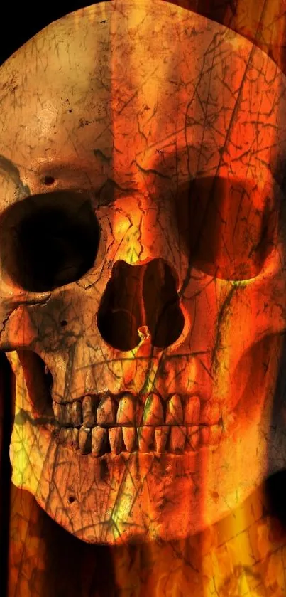 Fiery skull wallpaper with burning flames on a dark background.