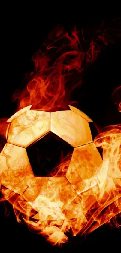 Fiery soccer ball engulfed in vivid flames on a black background.