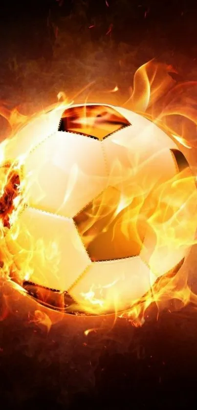 Soccer ball engulfed in bright flames on dark background.